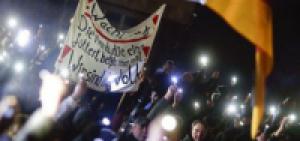 Тысячи митингующих в Дрездене требуют отставки Меркель